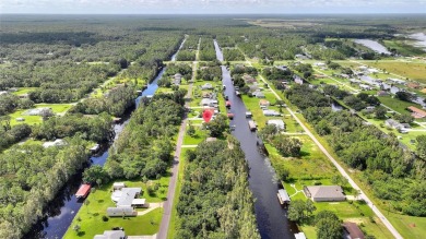 Don't Miss This Canal-Front Charmer!  Located in the desirable on Indian Lake Estates Golf and Country Club in Florida - for sale on GolfHomes.com, golf home, golf lot