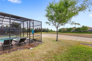 This VACATION HOME CHECKS ALL THE BOXES YOU'VE BEEN LOOKING FOR! on The Oasis Club at Champions Gate in Florida - for sale on GolfHomes.com, golf home, golf lot