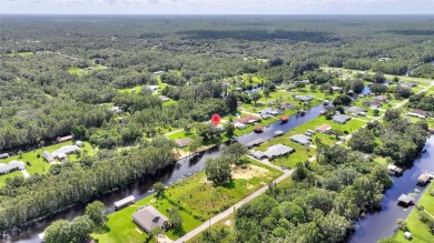 Don't Miss This Canal-Front Charmer!  Located in the desirable on Indian Lake Estates Golf and Country Club in Florida - for sale on GolfHomes.com, golf home, golf lot