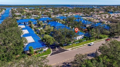 Discover this delightful 2 bedroom + den, 2.5 bath, 1 car on Mangrove Bay Golf Course in Florida - for sale on GolfHomes.com, golf home, golf lot