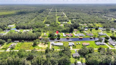 Don't Miss This Canal-Front Charmer!  Located in the desirable on Indian Lake Estates Golf and Country Club in Florida - for sale on GolfHomes.com, golf home, golf lot