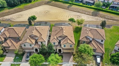 This VACATION HOME CHECKS ALL THE BOXES YOU'VE BEEN LOOKING FOR! on The Oasis Club at Champions Gate in Florida - for sale on GolfHomes.com, golf home, golf lot