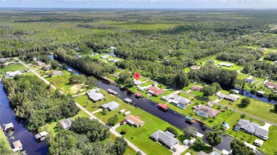 Don't Miss This Canal-Front Charmer!  Located in the desirable on Indian Lake Estates Golf and Country Club in Florida - for sale on GolfHomes.com, golf home, golf lot