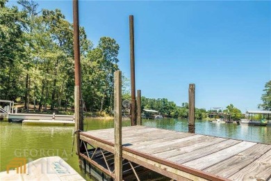 Prestigious neighborhood near golf club, dining, tennis, and more on Chattahoochee Golf Course in Georgia - for sale on GolfHomes.com, golf home, golf lot