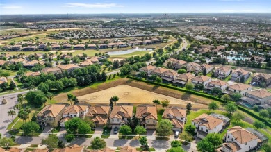 This VACATION HOME CHECKS ALL THE BOXES YOU'VE BEEN LOOKING FOR! on The Oasis Club at Champions Gate in Florida - for sale on GolfHomes.com, golf home, golf lot