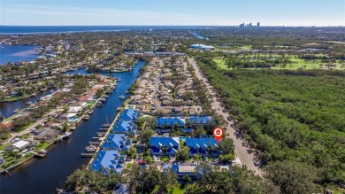 Discover this delightful 2 bedroom + den, 2.5 bath, 1 car on Mangrove Bay Golf Course in Florida - for sale on GolfHomes.com, golf home, golf lot