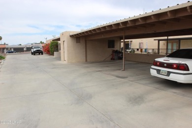 Golf Course area location with long-term tenant wanting to on London Bridge Golf Course in Arizona - for sale on GolfHomes.com, golf home, golf lot