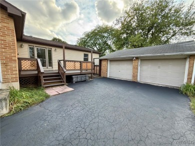 Welcome to this well-maintained 4-bedroom, 2-bath brick Ranch on Seneca Hickory Stick Golf Course in New York - for sale on GolfHomes.com, golf home, golf lot