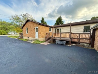 Welcome to this well-maintained 4-bedroom, 2-bath brick Ranch on Seneca Hickory Stick Golf Course in New York - for sale on GolfHomes.com, golf home, golf lot