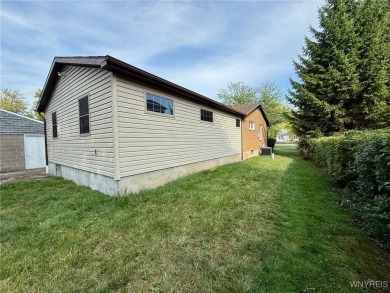 Welcome to this well-maintained 4-bedroom, 2-bath brick Ranch on Seneca Hickory Stick Golf Course in New York - for sale on GolfHomes.com, golf home, golf lot