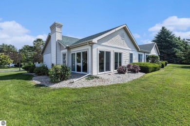 Welcome to easy living in the heart of Elk Rapids! This charming on Elk Rapids Golf Club in Michigan - for sale on GolfHomes.com, golf home, golf lot