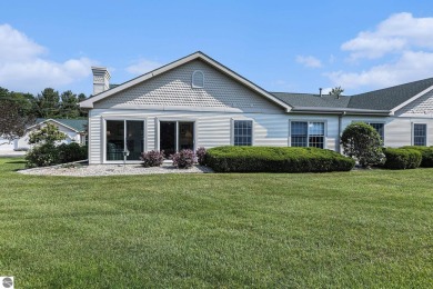 Welcome to easy living in the heart of Elk Rapids! This charming on Elk Rapids Golf Club in Michigan - for sale on GolfHomes.com, golf home, golf lot