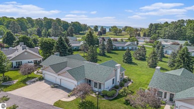 Welcome to easy living in the heart of Elk Rapids! This charming on Elk Rapids Golf Club in Michigan - for sale on GolfHomes.com, golf home, golf lot