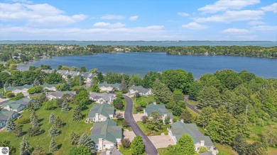 Welcome to easy living in the heart of Elk Rapids! This charming on Elk Rapids Golf Club in Michigan - for sale on GolfHomes.com, golf home, golf lot