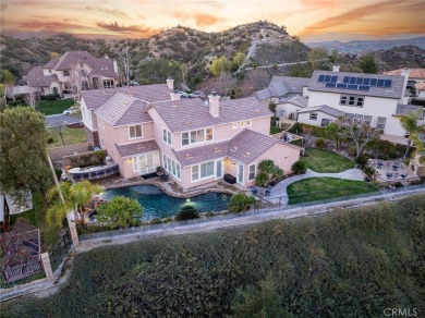 The beauty of Sand Canyon is on full display from this oversized on Robinson Ranch - Mountain Course in California - for sale on GolfHomes.com, golf home, golf lot