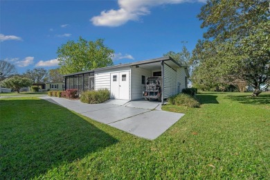 Nestled in the well-established Village of ORANGE BLOSSOM on Orange Blossom Hills Golf and Country Club in Florida - for sale on GolfHomes.com, golf home, golf lot