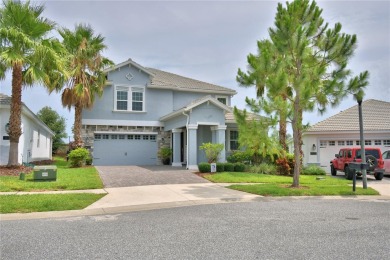 Located in the exclusive, gated community of ChampionsGate on The Oasis Club at Champions Gate in Florida - for sale on GolfHomes.com, golf home, golf lot