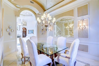 Discover this beautiful home in the Tesoro golf community on The Tesoro Golf Course and Club in Florida - for sale on GolfHomes.com, golf home, golf lot