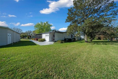 Nestled in the well-established Village of ORANGE BLOSSOM on Orange Blossom Hills Golf and Country Club in Florida - for sale on GolfHomes.com, golf home, golf lot
