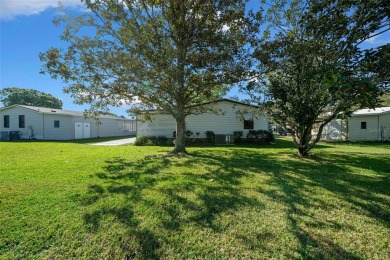 Nestled in the well-established Village of ORANGE BLOSSOM on Orange Blossom Hills Golf and Country Club in Florida - for sale on GolfHomes.com, golf home, golf lot