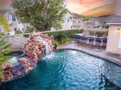 The beauty of Sand Canyon is on full display from this oversized on Robinson Ranch - Mountain Course in California - for sale on GolfHomes.com, golf home, golf lot