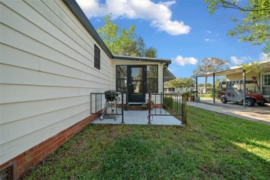 Nestled in the well-established Village of ORANGE BLOSSOM on Orange Blossom Hills Golf and Country Club in Florida - for sale on GolfHomes.com, golf home, golf lot