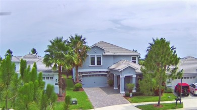 Located in the exclusive, gated community of ChampionsGate on The Oasis Club at Champions Gate in Florida - for sale on GolfHomes.com, golf home, golf lot
