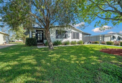 Nestled in the well-established Village of ORANGE BLOSSOM on Orange Blossom Hills Golf and Country Club in Florida - for sale on GolfHomes.com, golf home, golf lot