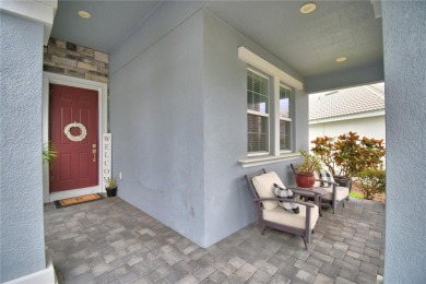 Located in the exclusive, gated community of ChampionsGate on The Oasis Club at Champions Gate in Florida - for sale on GolfHomes.com, golf home, golf lot