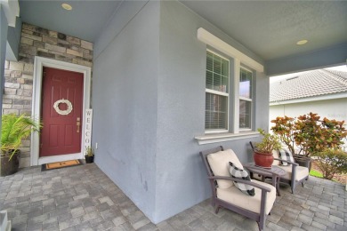 Located in the exclusive, gated community of ChampionsGate on The Oasis Club at Champions Gate in Florida - for sale on GolfHomes.com, golf home, golf lot