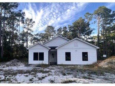 Great deal on nearly complete new construction on the golf on The Lakes Country Club in North Carolina - for sale on GolfHomes.com, golf home, golf lot