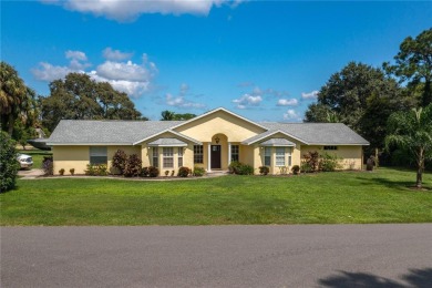 WATERFRONT HOME on CANAL TO BEAUTIFUL LAKE JUNE-- A Pool home on Placid Lakes Country Club in Florida - for sale on GolfHomes.com, golf home, golf lot