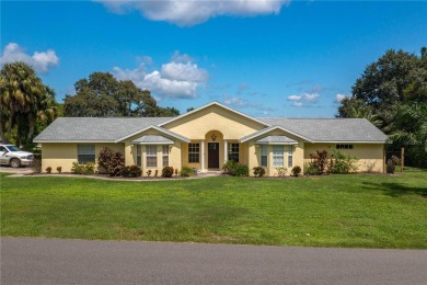 WATERFRONT HOME on CANAL TO BEAUTIFUL LAKE JUNE-- A Pool home on Placid Lakes Country Club in Florida - for sale on GolfHomes.com, golf home, golf lot
