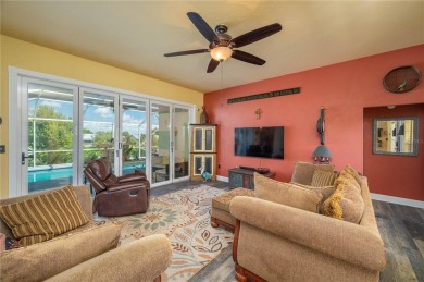 WATERFRONT HOME on CANAL TO BEAUTIFUL LAKE JUNE-- A Pool home on Placid Lakes Country Club in Florida - for sale on GolfHomes.com, golf home, golf lot