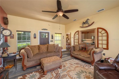 WATERFRONT HOME on CANAL TO BEAUTIFUL LAKE JUNE-- A Pool home on Placid Lakes Country Club in Florida - for sale on GolfHomes.com, golf home, golf lot