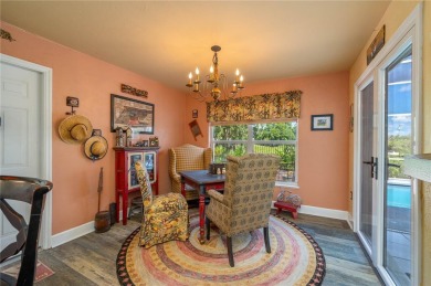 WATERFRONT HOME on CANAL TO BEAUTIFUL LAKE JUNE-- A Pool home on Placid Lakes Country Club in Florida - for sale on GolfHomes.com, golf home, golf lot