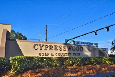 Welcome to this beautiful 2 bedroom/2 bath home. Enjoy cooking on Cypresswood Golf and Country Club in Florida - for sale on GolfHomes.com, golf home, golf lot