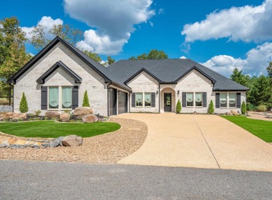 This stunning one-year old home located on the #3 hole of the on Granada Golf Course in Arkansas - for sale on GolfHomes.com, golf home, golf lot