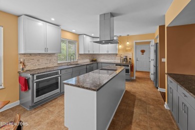 Located in the desirable Tellico Village community, this on Tanasi Golf Course in Tennessee - for sale on GolfHomes.com, golf home, golf lot