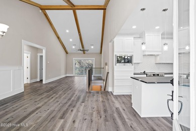 Experience the perfect blend of modern luxury and coastal charm on Brick Landing Plantation Yacht and Golf Club in North Carolina - for sale on GolfHomes.com, golf home, golf lot