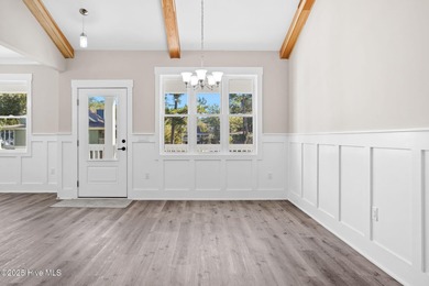 Experience the perfect blend of modern luxury and coastal charm on Brick Landing Plantation Yacht and Golf Club in North Carolina - for sale on GolfHomes.com, golf home, golf lot