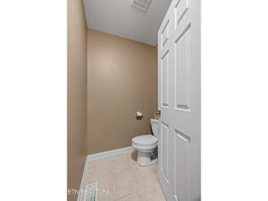 Located in the desirable Tellico Village community, this on Tanasi Golf Course in Tennessee - for sale on GolfHomes.com, golf home, golf lot