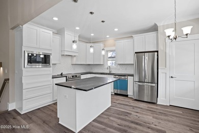 Experience the perfect blend of modern luxury and coastal charm on Brick Landing Plantation Yacht and Golf Club in North Carolina - for sale on GolfHomes.com, golf home, golf lot