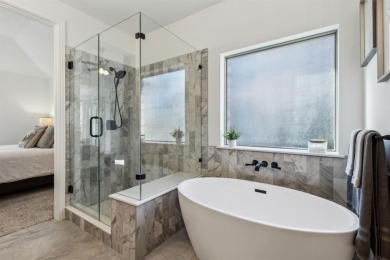 Experience the ultimate in luxury and privacy at 5221 Sylvan on The Tribute At the Colony in Texas - for sale on GolfHomes.com, golf home, golf lot