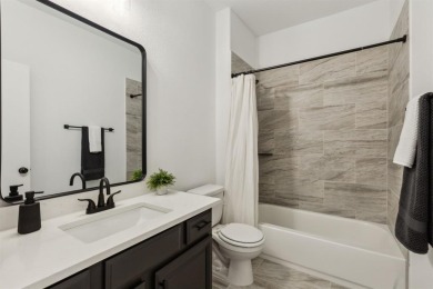 Experience the ultimate in luxury and privacy at 5221 Sylvan on The Tribute At the Colony in Texas - for sale on GolfHomes.com, golf home, golf lot