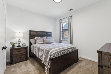 Experience the ultimate in luxury and privacy at 5221 Sylvan on The Tribute At the Colony in Texas - for sale on GolfHomes.com, golf home, golf lot