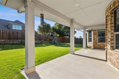 Experience the ultimate in luxury and privacy at 5221 Sylvan on The Tribute At the Colony in Texas - for sale on GolfHomes.com, golf home, golf lot