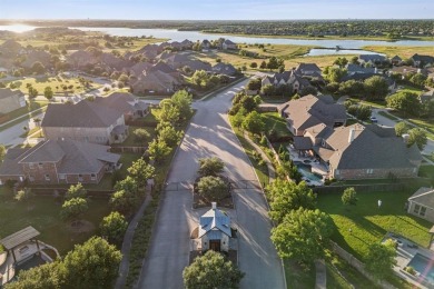 Experience the ultimate in luxury and privacy at 5221 Sylvan on The Tribute At the Colony in Texas - for sale on GolfHomes.com, golf home, golf lot