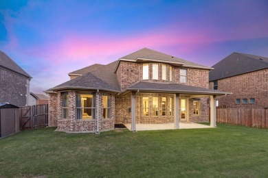 Experience the ultimate in luxury and privacy at 5221 Sylvan on The Tribute At the Colony in Texas - for sale on GolfHomes.com, golf home, golf lot