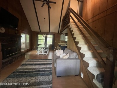 Welcome to this charming log-sided retreat offering 3 bedrooms on The Hideout Golf in Pennsylvania - for sale on GolfHomes.com, golf home, golf lot